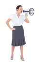 Stern businesswoman shouting in her megaphone Royalty Free Stock Photo