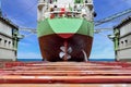 Stern of Cargo ship moored in floating dry dock. Royalty Free Stock Photo