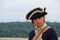 Stern expression on face of Young soldier during day's reenactment of soldier's life, Fort Ticonderoga,New York,2014 Royalty Free Stock Photo