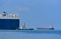 Stern of a large tanker cargo ship on route to sailing in the sea