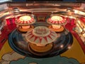 Stern Pinball machine playfield pop bumpers detail Royalty Free Stock Photo