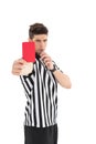 Stern referee showing red card