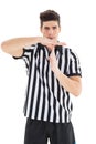 Stern referee showing time out sign