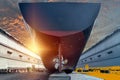 Stern ship with propeller rudder in floating dock.