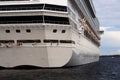 A stern view of a large cruise ship in port