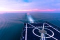 Stern of the warship and laminar flow of the water created by its propel with motion blur effect before sunset Royalty Free Stock Photo