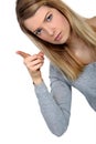 Stern young woman pointing Royalty Free Stock Photo