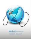 Stethoscope against a globe.