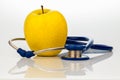 Stethoscope and apple. healthy eating Royalty Free Stock Photo