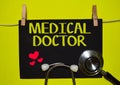 MEDICAL DOCTOR on top of yellow background Royalty Free Stock Photo