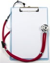 Stethoscope and blank clipboard