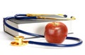 Stethoscope, book and apple Royalty Free Stock Photo