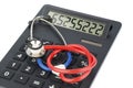 Stethoscope and calculator Royalty Free Stock Photo