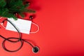 Stethoscope and christmas decoration, copy space. Christmas medical flatlay. Christmas medical flatly. New Year medical flatly. Royalty Free Stock Photo