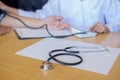 Stethoscope with clipboard and Laptop on desk Doctor working in Royalty Free Stock Photo