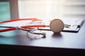 Stethoscope with clipboard and pen on desk Royalty Free Stock Photo