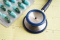 Stethoscope on electrocardiogram (ECG), heart wave, heart attack, cardiogram report Royalty Free Stock Photo