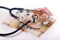 Stethoscope on euro money - healthcare cost concept Royalty Free Stock Photo