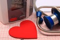 Stethoscope, heart shape, blood pressure monitor on electrocardiogram Royalty Free Stock Photo