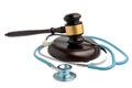 Stethoscope with judge gavel isolated on white Royalty Free Stock Photo