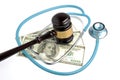 Stethoscope with judge gavel, money isolated on white Royalty Free Stock Photo