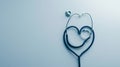 A stethoscope laid out in the shape of a heart on a blue background, suggesting healthcare love