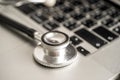 Stethoscope on laptop computer keyboard, Medical health concept Royalty Free Stock Photo