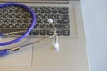 Stethoscope on laptop keyboard. Health care or IT security concept. Laptop repair concept. Computer repair concept Close Royalty Free Stock Photo