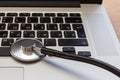 Stethoscope lies on the laptop keyboard. Royalty Free Stock Photo