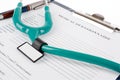 Stethoscope on medical document Royalty Free Stock Photo