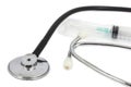 Stethoscope and medical syring Royalty Free Stock Photo