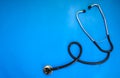 Stethoscope and medicine on blue background, Medical and Healthcare concept Royalty Free Stock Photo