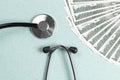 Stethoscope and money, concept. Paid medicine. Costs for the medical insurance Royalty Free Stock Photo