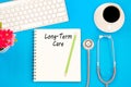 Stethoscope on notebook and pencil with Long Term Care words as