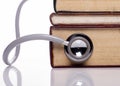 Stethoscope on old book Royalty Free Stock Photo