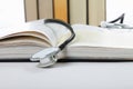 Stethoscope on open book Royalty Free Stock Photo