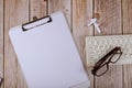 Stethoscope and paper notebook on keyboard on a wooden table background Royalty Free Stock Photo