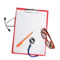 Stethoscope, pen and glasses on red clipboard cut out Royalty Free Stock Photo