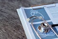 Stethoscope and pen on report pad ,health and medical insurance concept Royalty Free Stock Photo