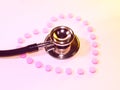 Stethoscope and pill heart