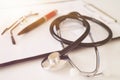 Stethoscope with prescription clipboard, Healthcare. Royalty Free Stock Photo