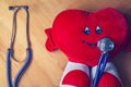 Heart plush with stethoscope Royalty Free Stock Photo