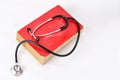 Stethoscope on red old book Royalty Free Stock Photo