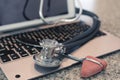 Stethoscope reflex hammer on keyboard countertop ready for use and data entry Royalty Free Stock Photo