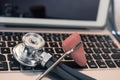Stethoscope reflex hammer on keyboard countertop ready for use and data entry Royalty Free Stock Photo