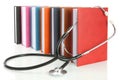 Stethoscope with a stack of books