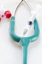 Stethoscope and syring Royalty Free Stock Photo