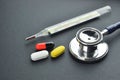 Stethoscope, Thermometer and Medication
