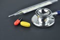 Stethoscope, Thermometer and Medications