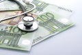 stethoscope on top of euro banknotes Royalty Free Stock Photo
